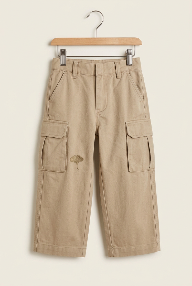 Outdoor Balance junior cargo trousers in sand, front on hanger