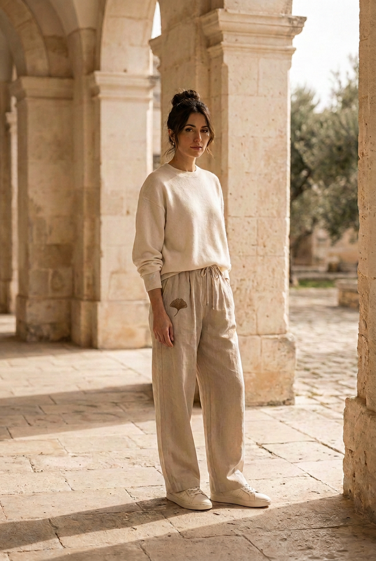 Model wearing the Soft Essentials sand drawstring trousers