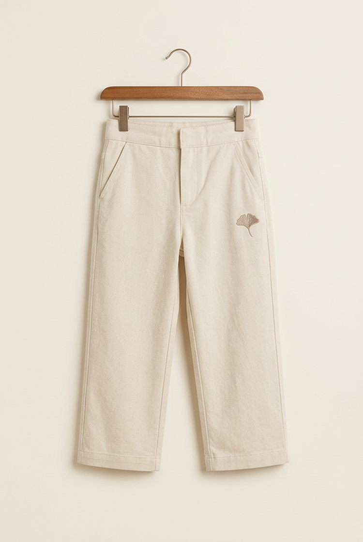Layering Style junior straight trousers in ivory, front on hanger