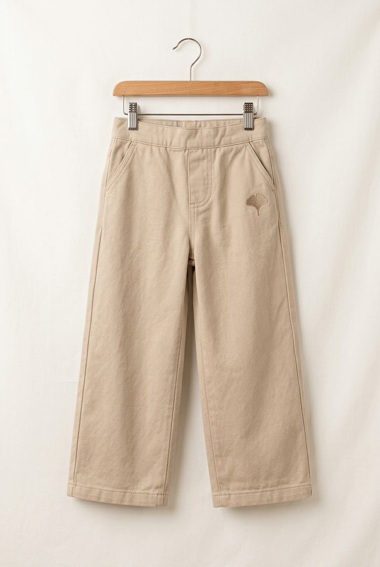 Soft Essentials junior wide trousers in sand, front on hanger
