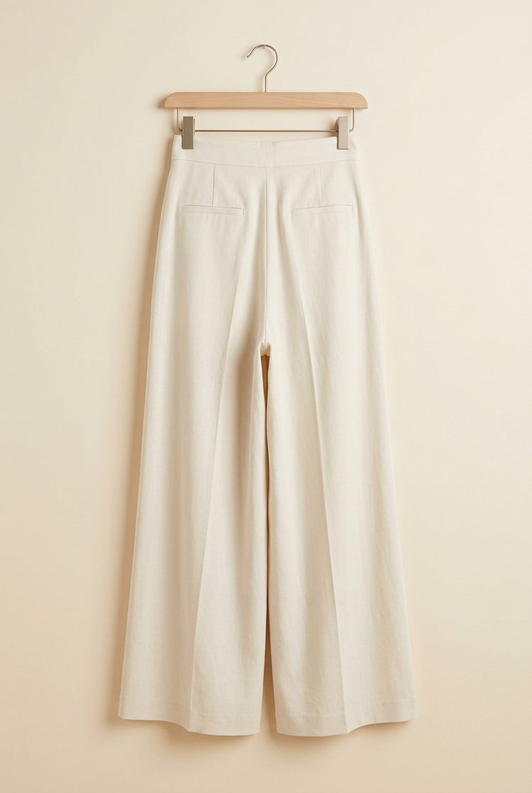 Minimal Luxury ivory pleated palazzo trousers, back